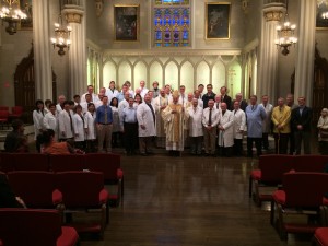 Doctors and healthcare representatives gather in the Cathedral after the first "White Mass" in the Archdiocese. 