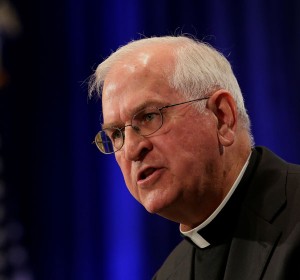 Archbishop Joseph E. Kurtz of Louisville, Ky., president of the U.S. Conference of Catholic Bishops, gives his presidential address Nov. 10, the first day of the annual fall general assembly of the USCCB in Baltimore. He reminded his fellow bishops that their role is to accompany the family of the church through members' fears and concerns. (CNS/Bob Roller)