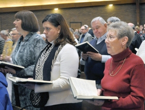 Parishioners of St. Barnabas Church joined in singing at the parish’s closing Mass Nov. 22.