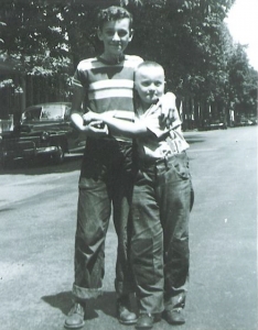 My brother George on the right hugging my neighbor Jackie Doyle.